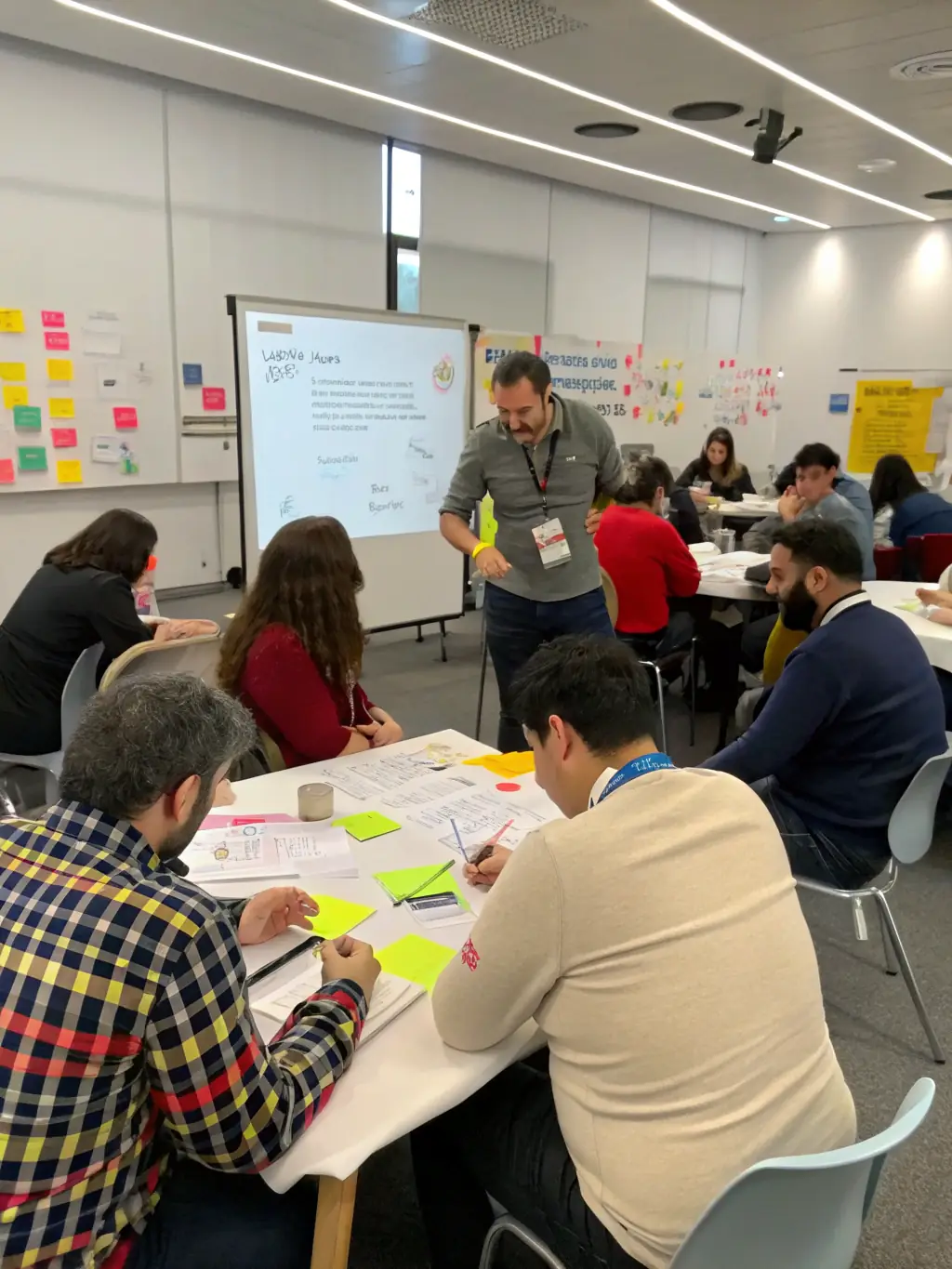 A photograph of a workshop session at the Cape Town Innovation Festival, focusing on 'Blockchain for Beginners, ' with participants actively engaging with the instructor.